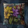 Concrete Bloom graffiti floral cushion, 16 inch double-sided, on a dark graffiti backdrop