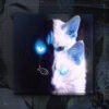 Copy Cat canvas print - a glitched white cat with glowing blue eyes on a dark studio backdrop